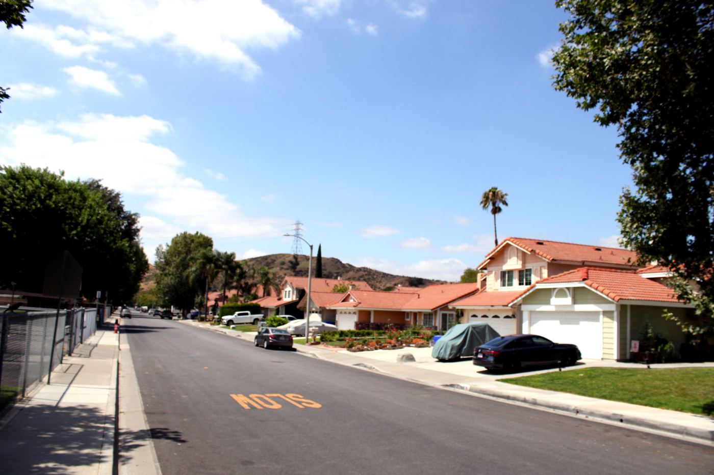 Residential hillside street in Castaic, Santa Clarita, with homes and mountain views
