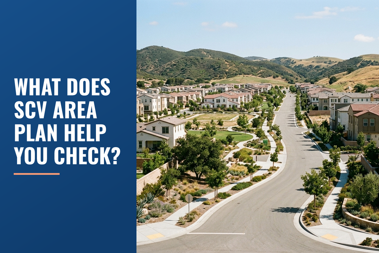 An elevated view of a Santa Clarita Valley neighborhood with tile-roof houses, drought-aware landscaping, and rolling hills in the background.