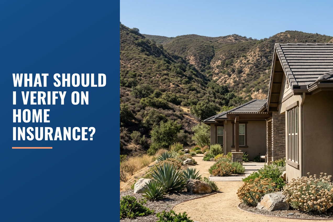 A modern home exterior with tile roof and drought-tolerant landscaping in front of dry Southern California hills.