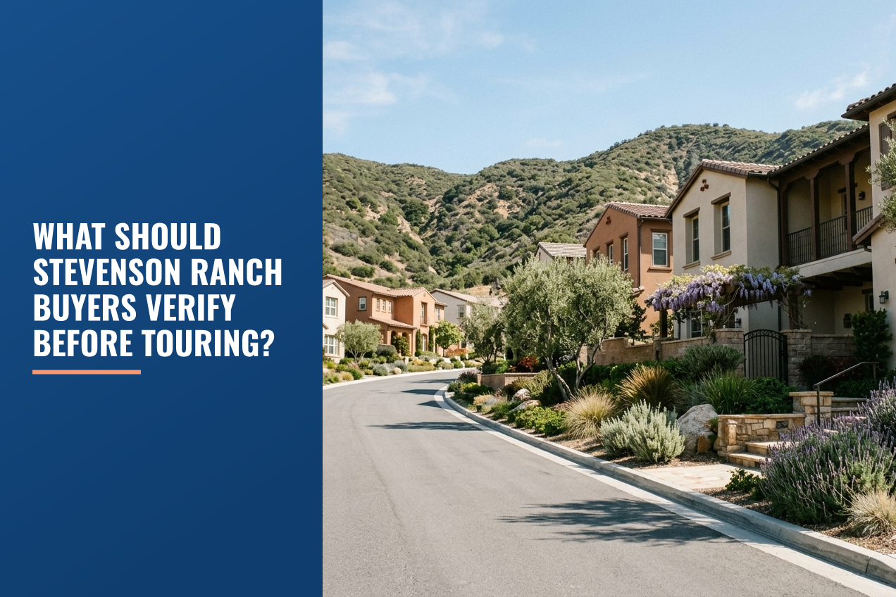 A quiet residential street in a hilly area with Mediterranean-style stucco homes, drought-resistant landscaping, and mountain foothills.