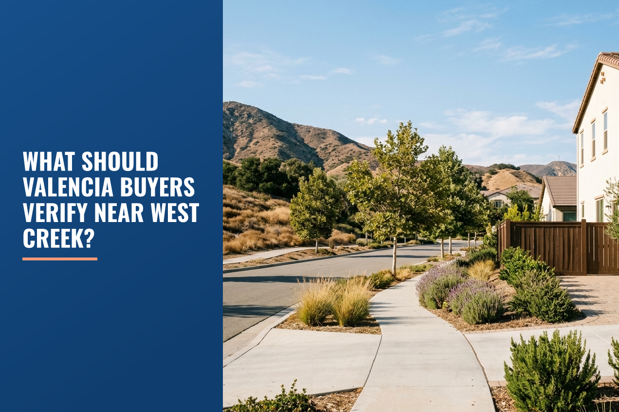 A suburban street in Santa Clarita with drought-aware landscaping, a modern stucco house, and foothills in the background under clear light.