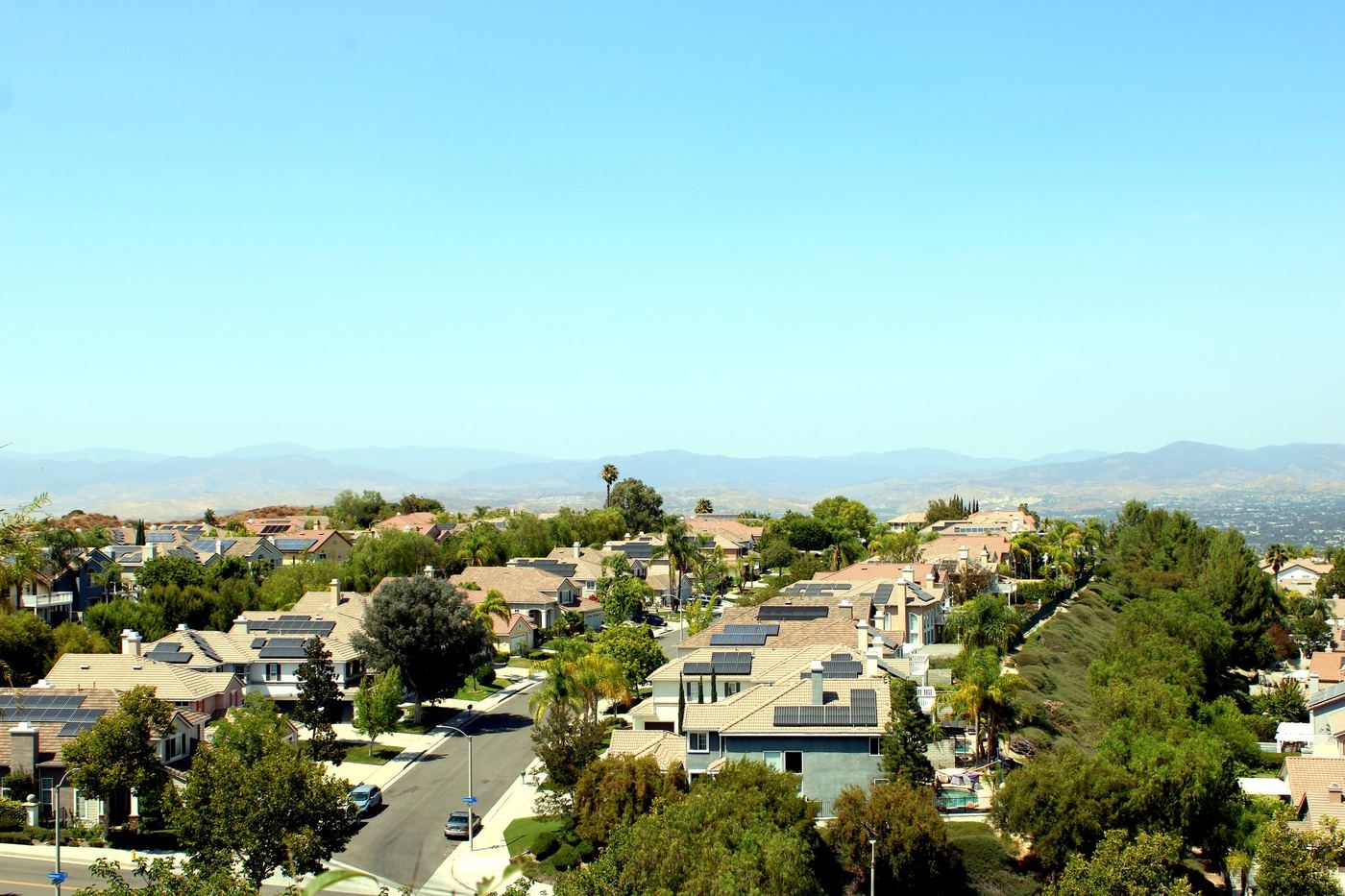 Aerial view of a Stevenson Ranch neighborhood in Santa Clarita, California with the Santa Susana Mountains in the background