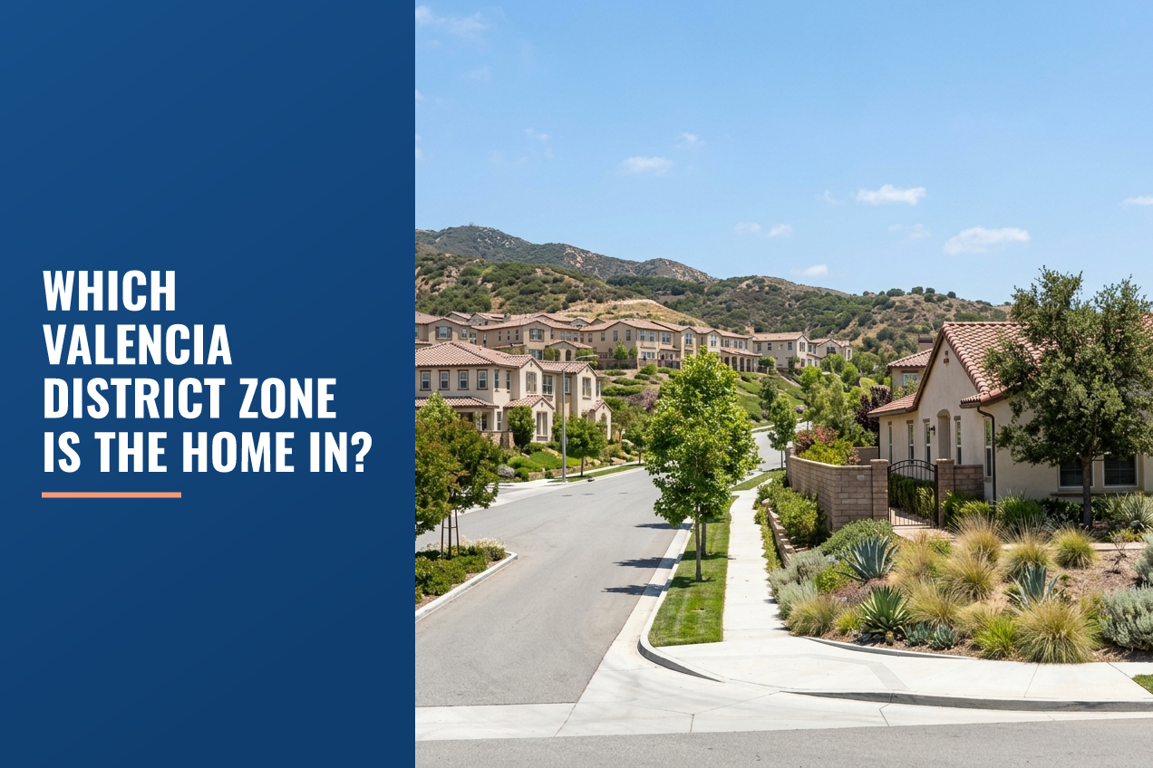 A quiet residential street in Santa Clarita with stucco homes, tile roofs, drought-tolerant landscaping, and rolling hills in the background.